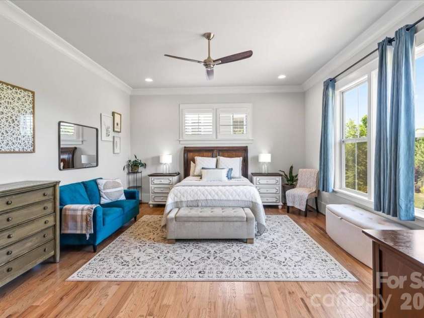 559 Preservation Drive, Fort Mill, SC 29715.  MLS# CAR4369169, YatesRealty ID 18120. Primary suite on main... spacious, light-filled, and designed for true living with thoughtful separation of space