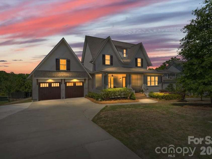 559 Preservation Drive, Fort Mill, SC 29715.  MLS# CAR4369169, YatesRealty ID 18120. Twilight elevates the craftsman charm... your evenings will look like this.