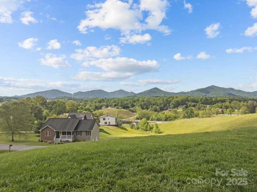 66 Lawson Ridge Road, Leicester, NC 28748.  MLS# CAR4258146, YatesRealty ID 18120. 