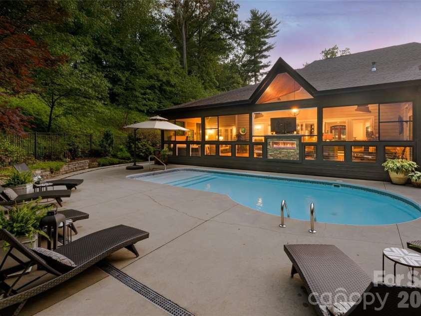 300 White Pine Drive, Hendersonville, NC 28739.  MLS# CAR4375911, YatesRealty ID 18122. Backyard and pool
