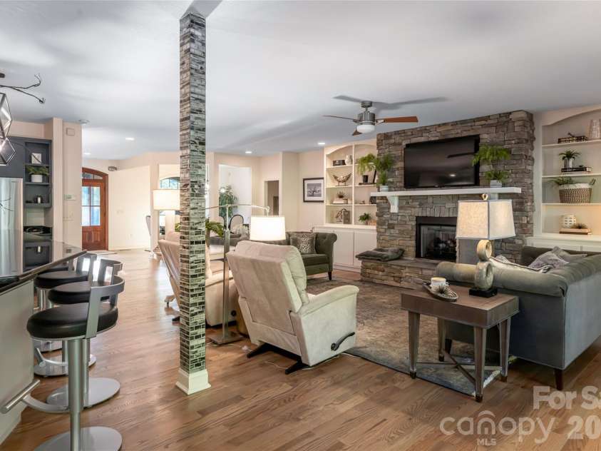 300 White Pine Drive, Hendersonville, NC 28739.  MLS# CAR4375911, YatesRealty ID 18122. Living room and kitchen