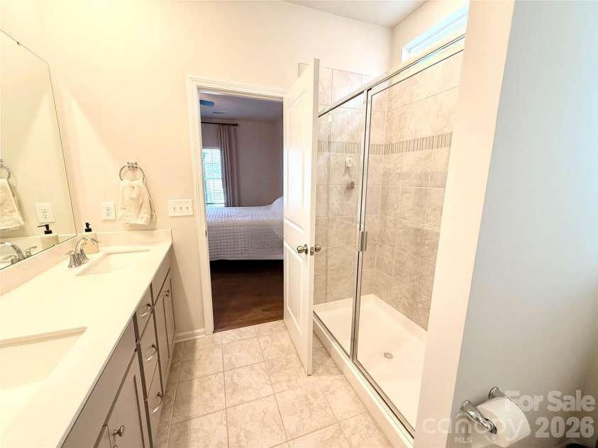 6570 Gopher Road, Lancaster, SC 29720.  MLS# CAR4343153, YatesRealty ID 18124. Primary bathroom with large tiled shower.
