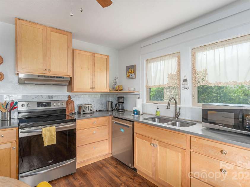 7 Grove Street, Weaverville, NC 28787.  MLS# CAR4262820, YatesRealty ID 18128. Bright Kitchen with generous countertop space