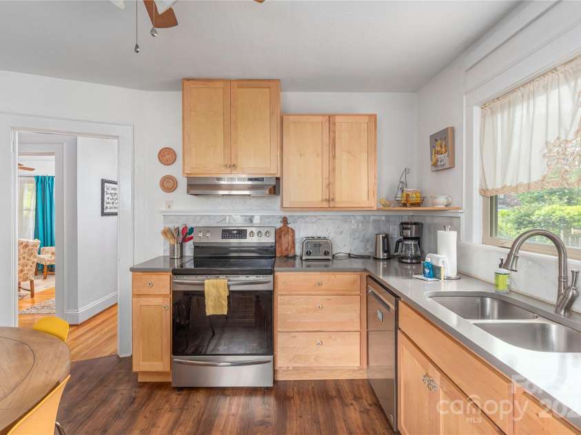 7 Grove Street, Weaverville, NC 28787.  MLS# CAR4262820, YatesRealty ID 18128. Kitchen different angle