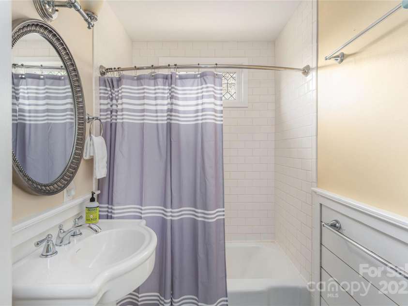 7 Grove Street, Weaverville, NC 28787.  MLS# CAR4262820, YatesRealty ID 18128. Main Level Full Bathroom