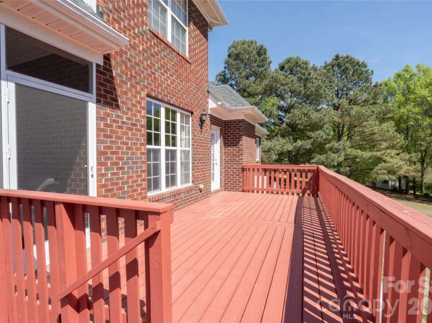 7008 Brett Drive, Monroe, NC 28110.  MLS# CAR4368447, YatesRealty ID 18129. Brand new Deck