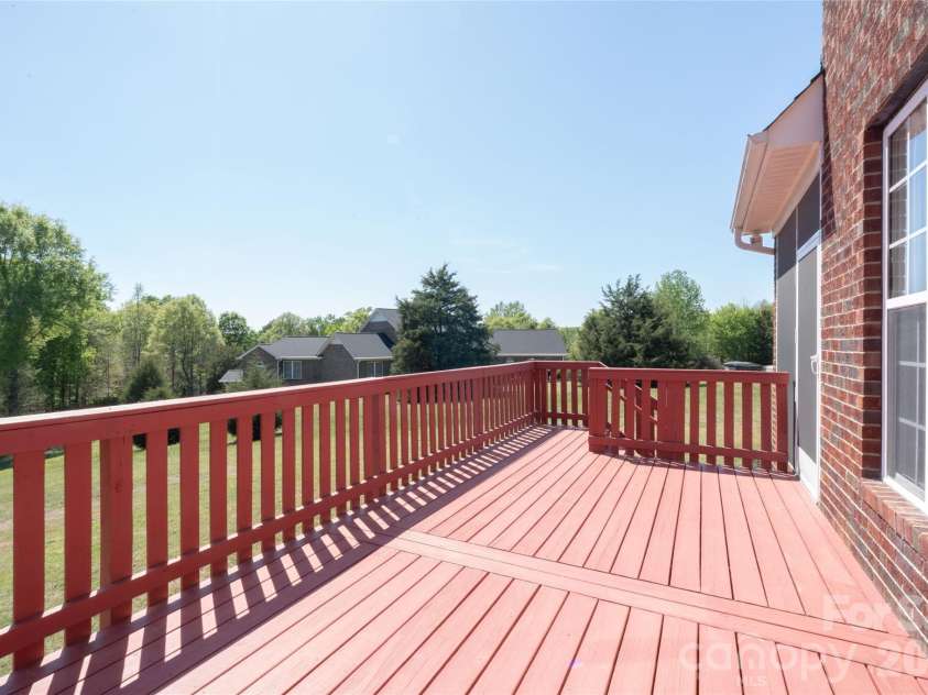 7008 Brett Drive, Monroe, NC 28110.  MLS# CAR4368447, YatesRealty ID 18129. Brand new spacious deck
