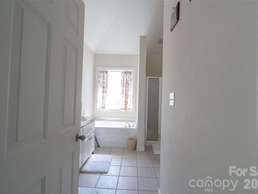 7008 Brett Drive, Monroe, NC 28110.  MLS# CAR4368447, YatesRealty ID 18129. Primary Bathroom
