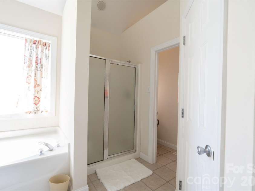 7008 Brett Drive, Monroe, NC 28110.  MLS# CAR4368447, YatesRealty ID 18129. Primary Bathroom