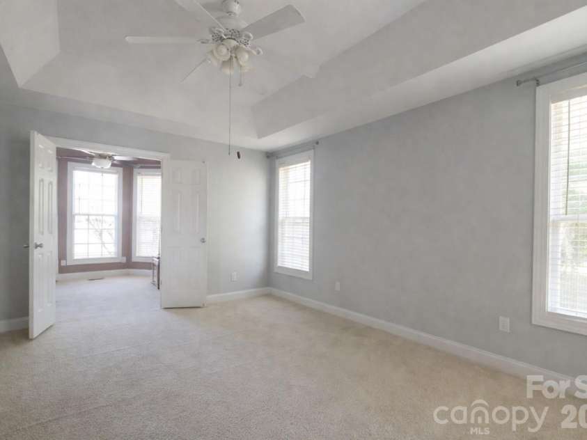 7008 Brett Drive, Monroe, NC 28110.  MLS# CAR4368447, YatesRealty ID 18129. Primary Bedroom with seperate sitting room