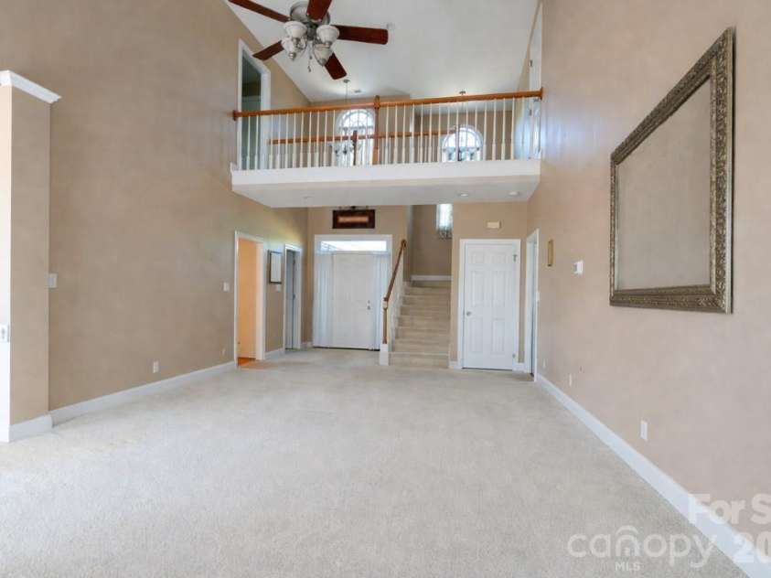 7008 Brett Drive, Monroe, NC 28110.  MLS# CAR4368447, YatesRealty ID 18129. Two story great room