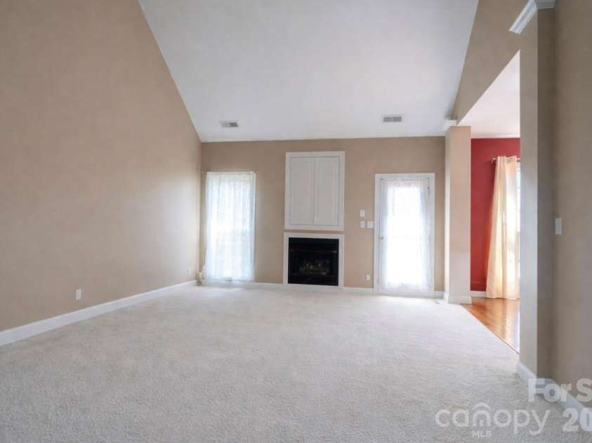 7008 Brett Drive, Monroe, NC 28110.  MLS# CAR4368447, YatesRealty ID 18129. Two story great room
