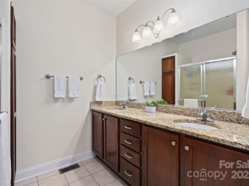 23 Holiday Drive, Arden, NC 28704.  MLS# CAR4312790, YatesRealty ID 1813. Primary Bath