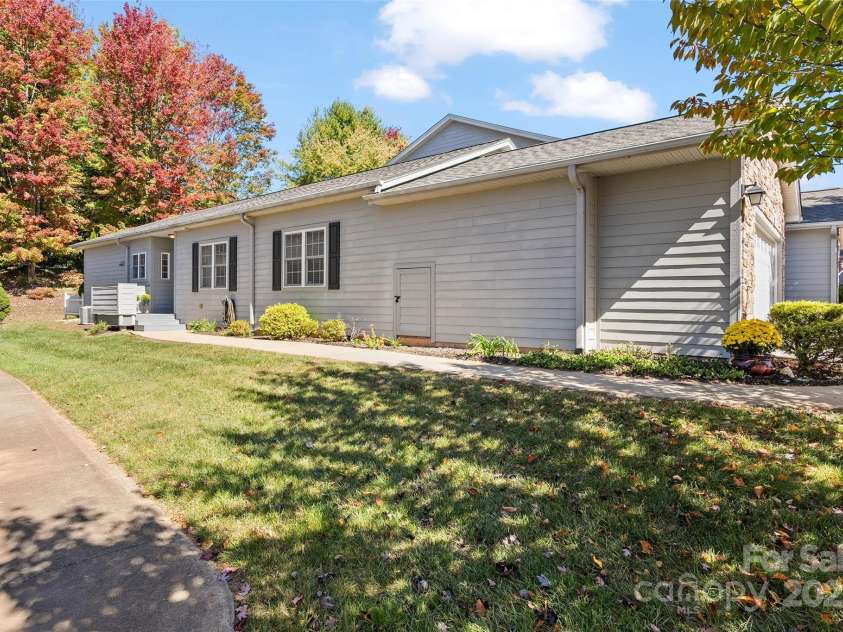 23 Holiday Drive, Arden, NC 28704.  MLS# CAR4312790, YatesRealty ID 1813. Side View and Entrance