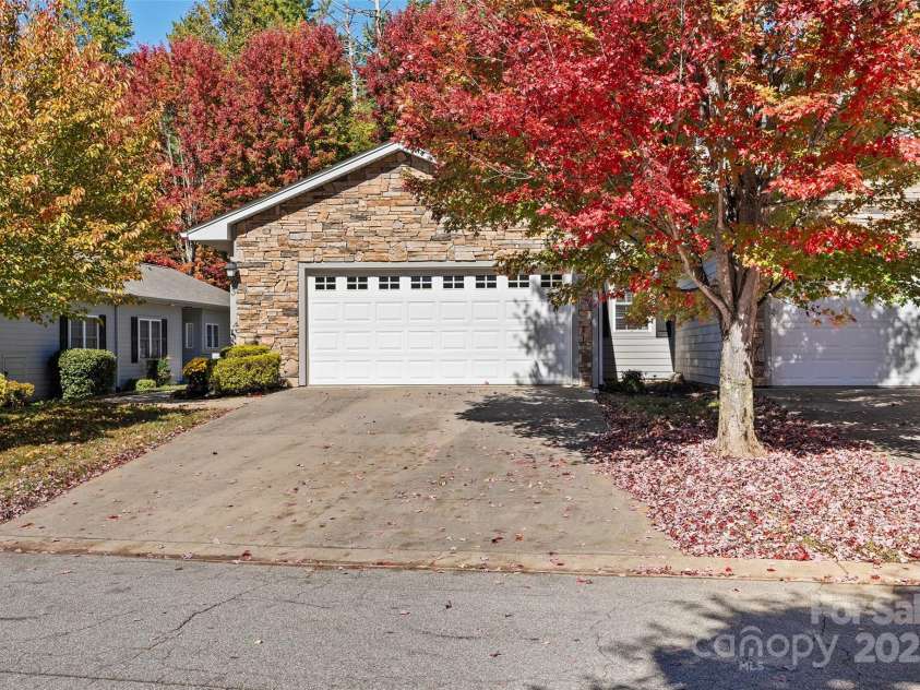 23 Holiday Drive, Arden, NC 28704.  MLS# CAR4312790, YatesRealty ID 1813. Street view with Garage