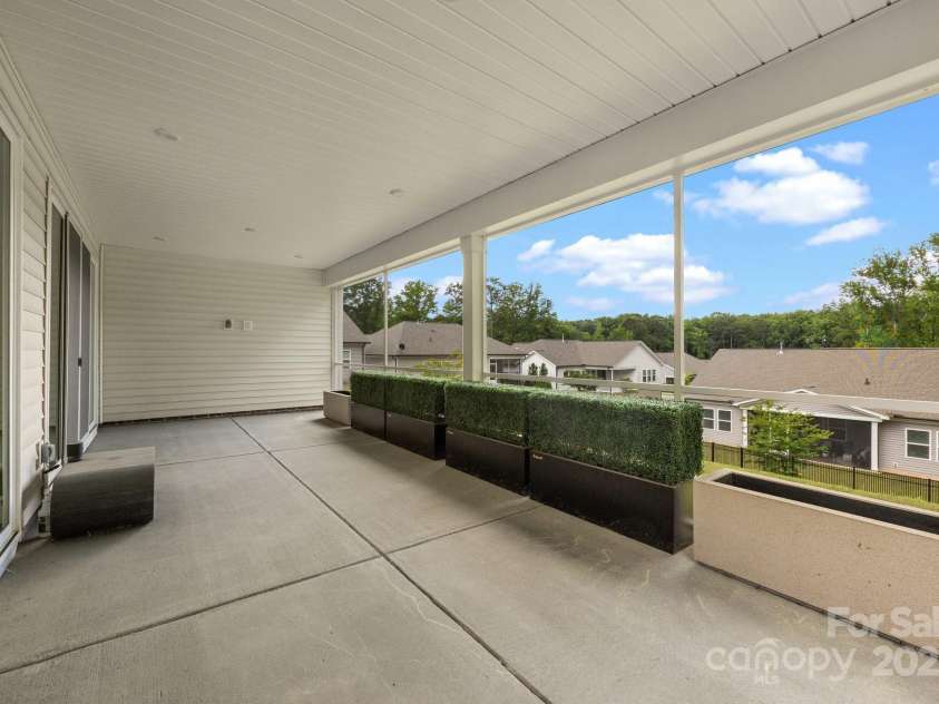 315 Skyebrook Lane, Rock Hill, SC 29730.  MLS# CAR4219949, YatesRealty ID 18131. This patio is ready and waiting for you! prewired for TV, the hedge will remain, so will the planter.