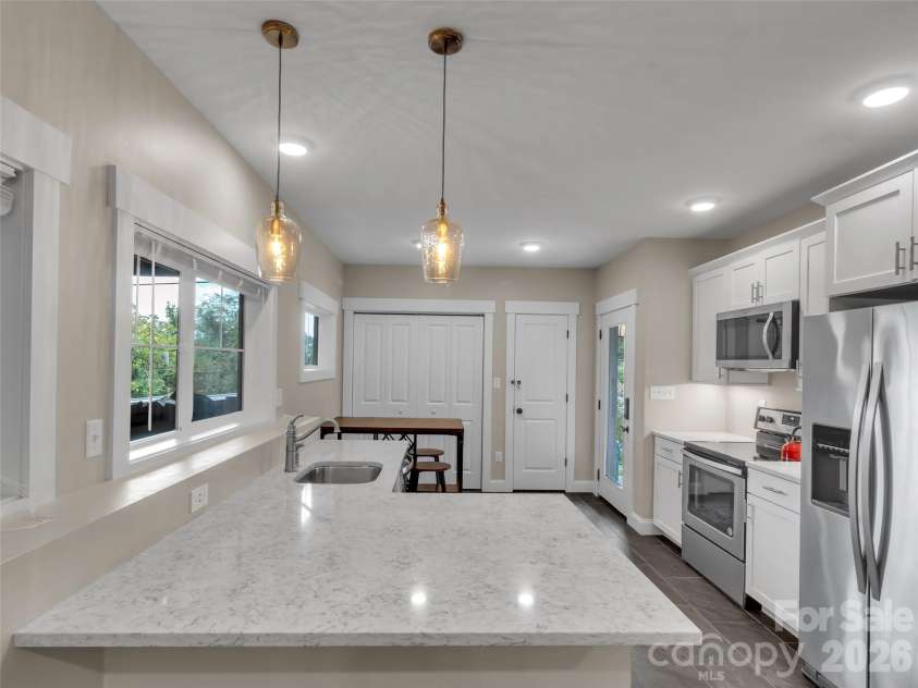 17 Elkmont Terrace, Asheville, NC 28804.  MLS# CAR4298247, YatesRealty ID 18136. Basement level.