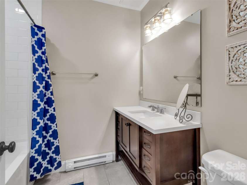 17 Elkmont Terrace, Asheville, NC 28804.  MLS# CAR4298247, YatesRealty ID 18136. Basement level.