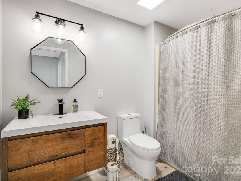 1245 Old Fort Road, Fairview, NC 28730.  MLS# CAR4258994, YatesRealty ID 18139. Basement Bath #1