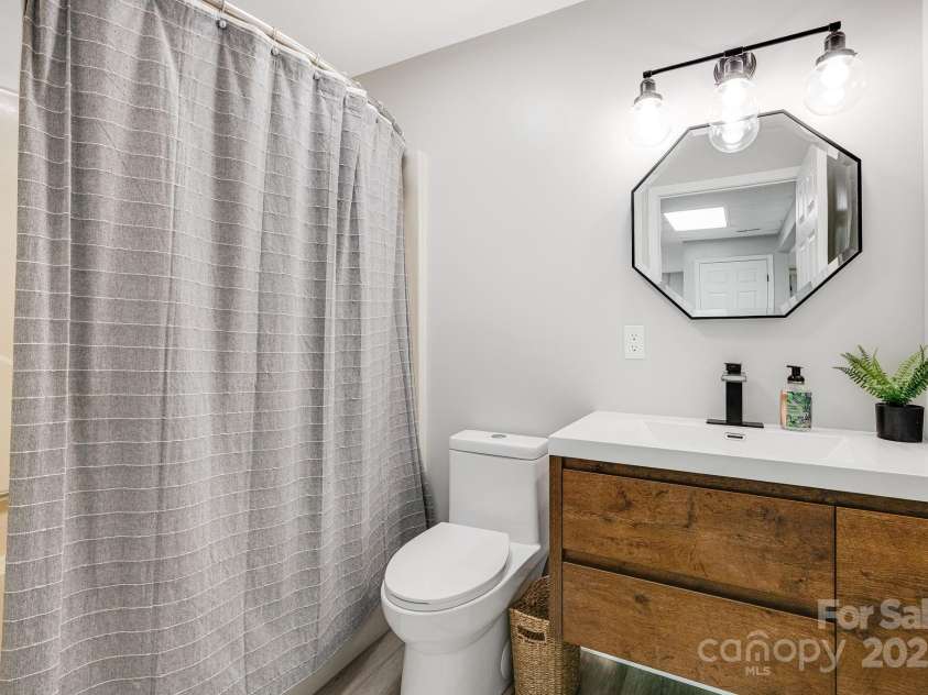 1245 Old Fort Road, Fairview, NC 28730.  MLS# CAR4258994, YatesRealty ID 18139. Basement Bath #2