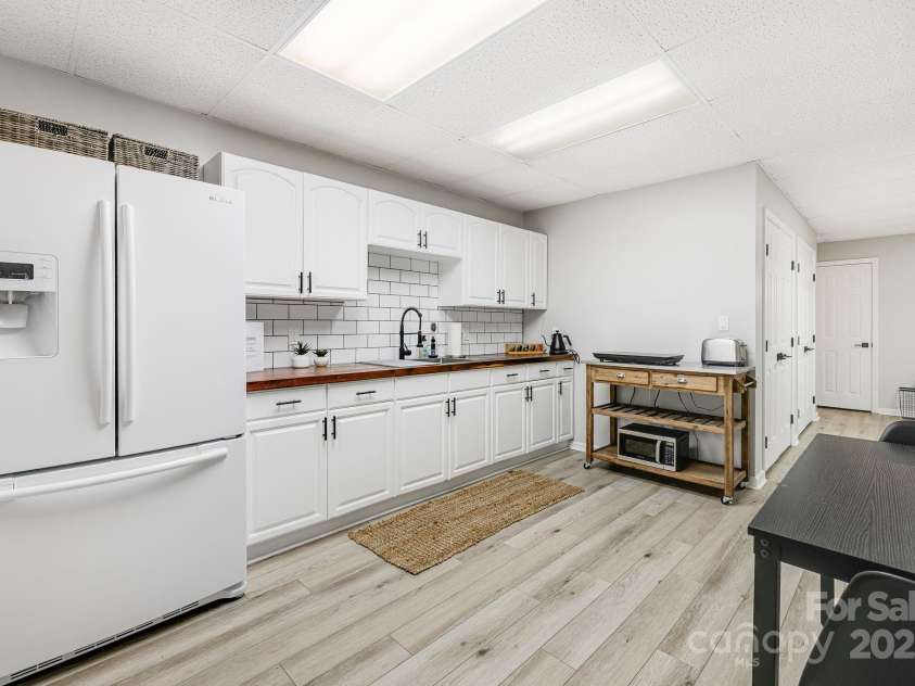 1245 Old Fort Road, Fairview, NC 28730.  MLS# CAR4258994, YatesRealty ID 18139. Basement Kitchen
