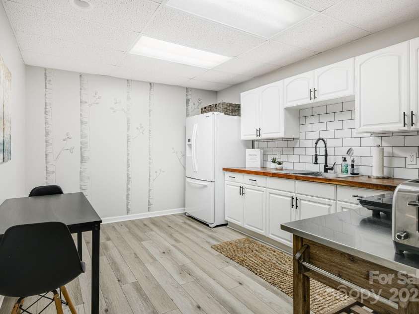 1245 Old Fort Road, Fairview, NC 28730.  MLS# CAR4258994, YatesRealty ID 18139. Basement Kitchen