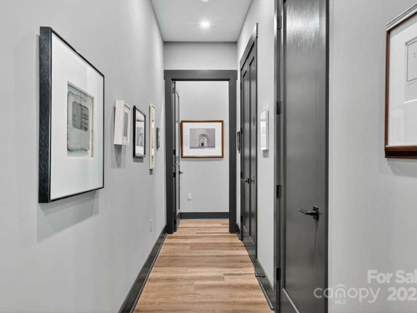 36 Northland Court, Flat Rock, NC 28731.  MLS# CAR4293031, YatesRealty ID 1814. Hallway to primary suite