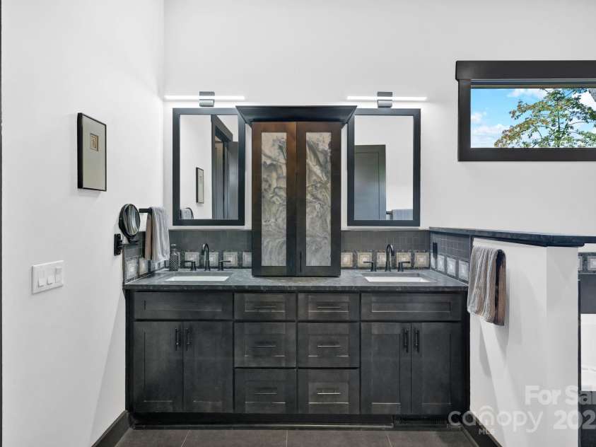 36 Northland Court, Flat Rock, NC 28731.  MLS# CAR4293031, YatesRealty ID 1814. Primary vanity w/ double sinks