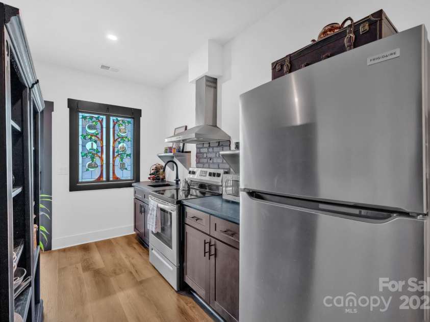 36 Northland Court, Flat Rock, NC 28731.  MLS# CAR4293031, YatesRealty ID 1814. Studio Kitchen 