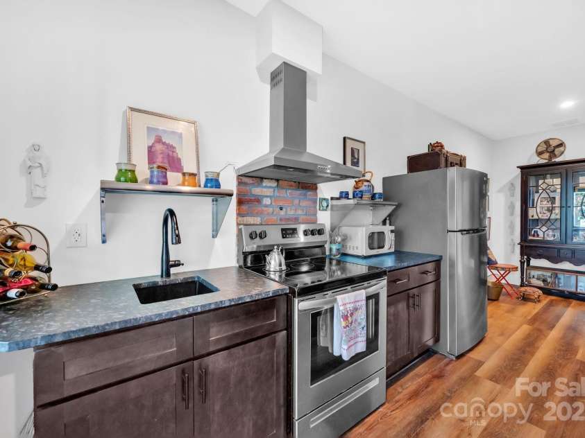 36 Northland Court, Flat Rock, NC 28731.  MLS# CAR4293031, YatesRealty ID 1814. Studio kitchen perfect for guests 