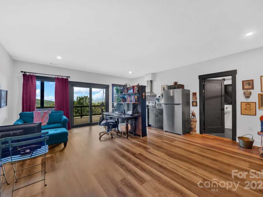 36 Northland Court, Flat Rock, NC 28731.  MLS# CAR4293031, YatesRealty ID 1814. Studio living space with private exterior entrance