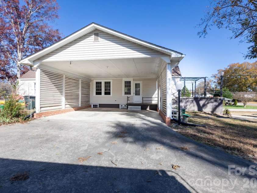 1402 Brantley Road, Kannapolis, NC 28083.  MLS# CAR4320766, YatesRealty ID 18145. 2 Car carport