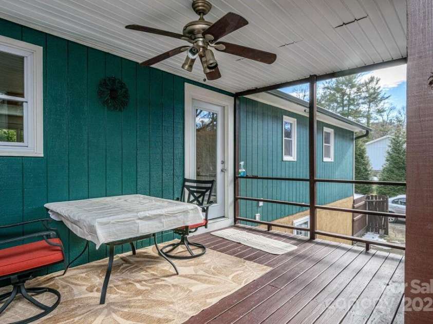 520 Corbly Drive, Hendersonville, NC 28739.  MLS# CAR4214880, YatesRealty ID 18148. Screened Porch View 3
