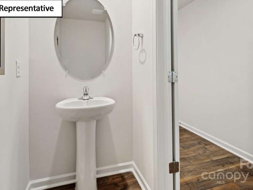 5908 Faron Way, Charlotte, NC 28262.  MLS# CAR4268511, YatesRealty ID 18158. First floor powder room
