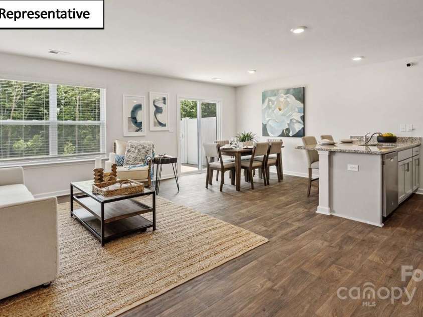 5908 Faron Way, Charlotte, NC 28262.  MLS# CAR4268511, YatesRealty ID 18158. Open concept family room and kitchen