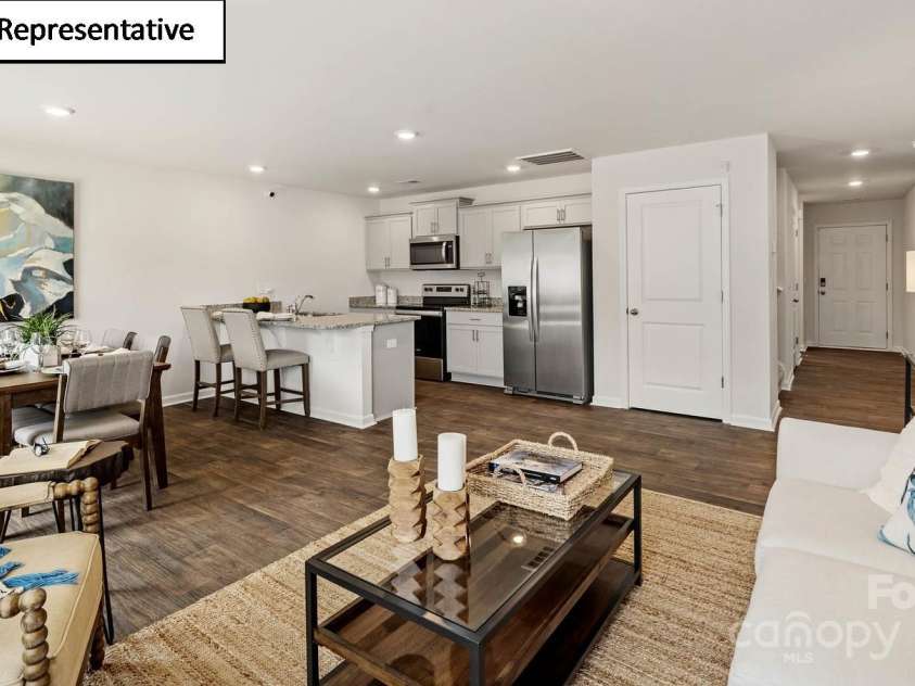 5908 Faron Way, Charlotte, NC 28262.  MLS# CAR4268511, YatesRealty ID 18158. Open concept family room and kitchen