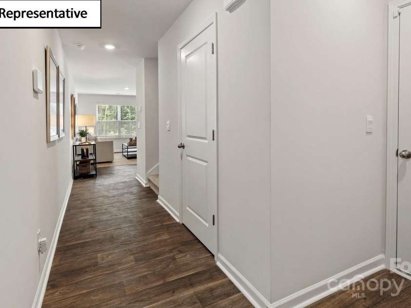 5106 Hyrule Drive, Charlotte, NC 28262.  MLS# CAR4268519, YatesRealty ID 18160. Long foyer upon entry from front door