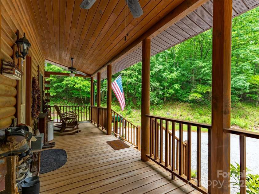 125 Cypress Lane, Saluda, NC 28773.  MLS# CAR4265595, YatesRealty ID 18163. Sit a while and just breath ...