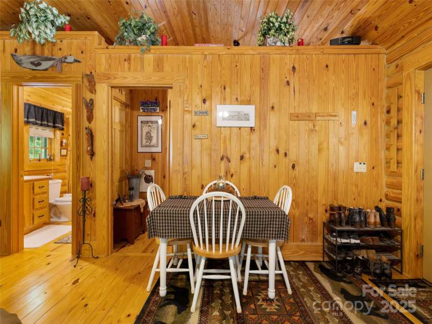 125 Cypress Lane, Saluda, NC 28773.  MLS# CAR4265595, YatesRealty ID 18163. This cabin was designed for one or two with outdoor space to explore and an additional building for fun, guests, vehicles or hobbies.