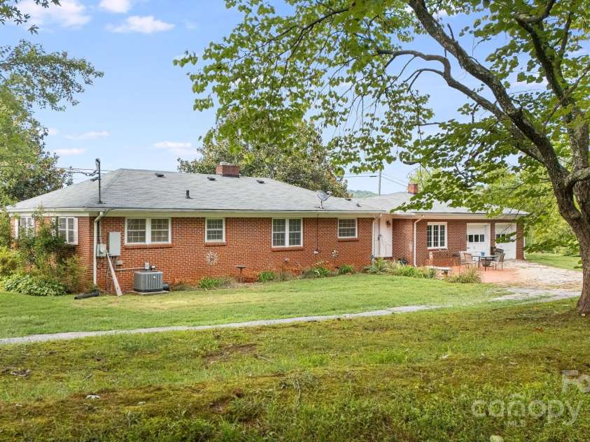 1694 Mud Cut Road, Marion, NC 28752.  MLS# CAR4218182, YatesRealty ID 18169. Large shade trees