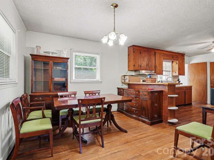 831 Maurice Street, Monroe, NC 28112.  MLS# CAR4370093, YatesRealty ID 18169. Dining area into kitchen
