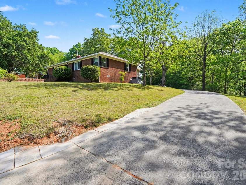 831 Maurice Street, Monroe, NC 28112.  MLS# CAR4370093, YatesRealty ID 18169. Front Driveway