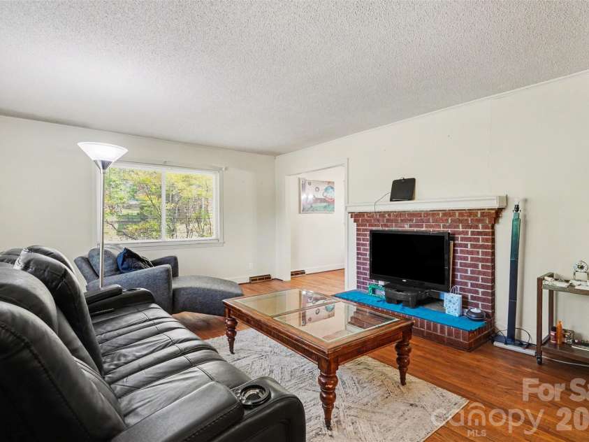 831 Maurice Street, Monroe, NC 28112.  MLS# CAR4370093, YatesRealty ID 18169. Living Room