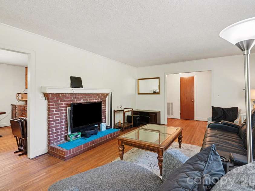 831 Maurice Street, Monroe, NC 28112.  MLS# CAR4370093, YatesRealty ID 18169. Living Room