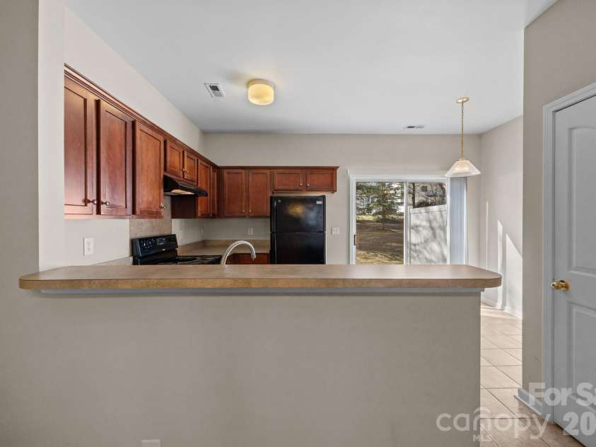 3527 Creeping Flora Lane, Charlotte, NC 28216.  MLS# CAR4336635, YatesRealty ID 18170. 