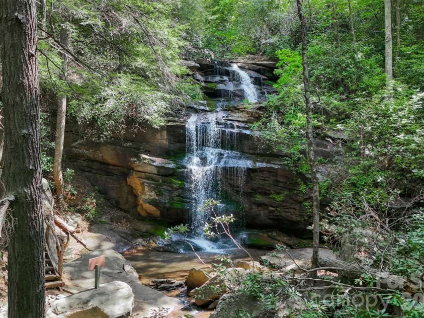 491 Mckenzie Way, Old Fort, NC 28762.  MLS# CAR4372804, YatesRealty ID 18172. Waterfall Park Falls