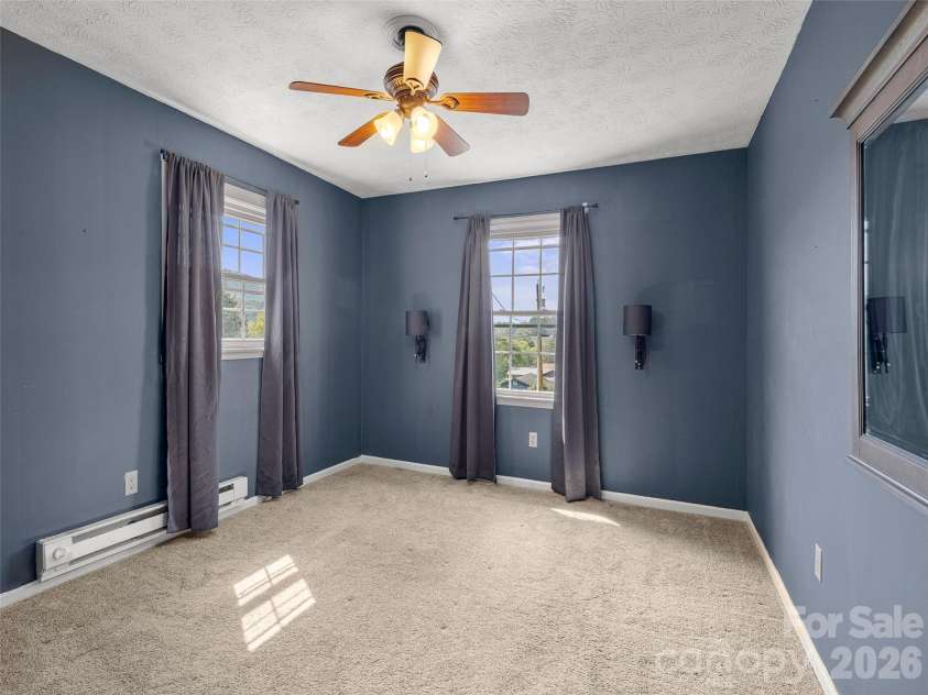 84 Candlelight Circle, Clyde, NC 28721.  MLS# CAR4376602, YatesRealty ID 18175. 