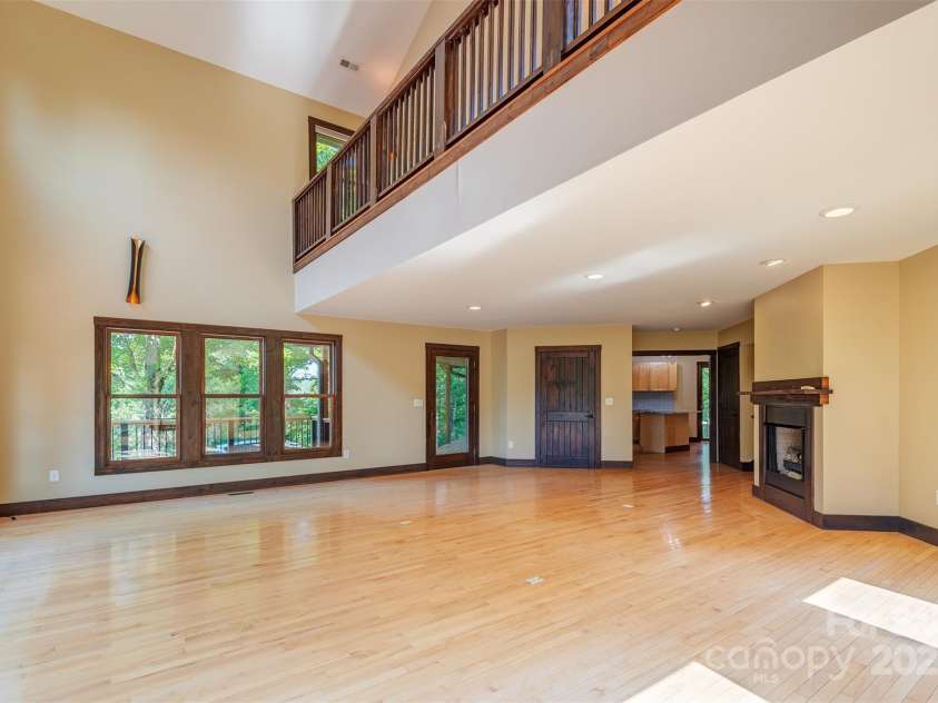 15 Mountain Tea Lane, Alexander, NC 28701.  MLS# CAR4276660, YatesRealty ID 18176. 20ft Cathedral Ceiling