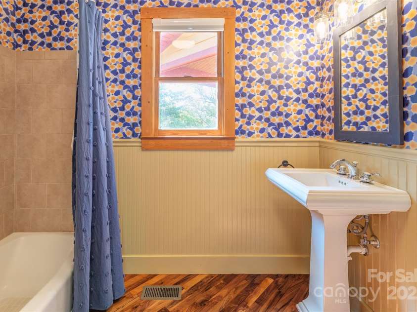 15 Mountain Tea Lane, Alexander, NC 28701.  MLS# CAR4276660, YatesRealty ID 18176. Main Floor Bathroom
