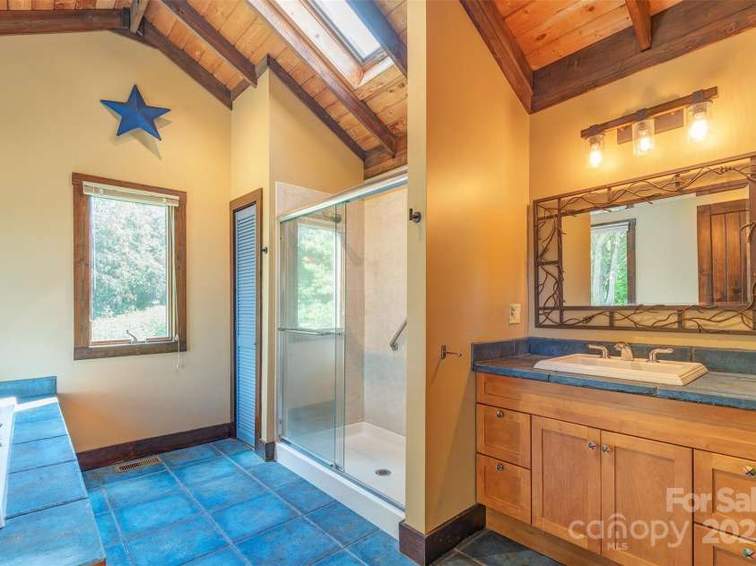 15 Mountain Tea Lane, Alexander, NC 28701.  MLS# CAR4276660, YatesRealty ID 18176. Primary Suite